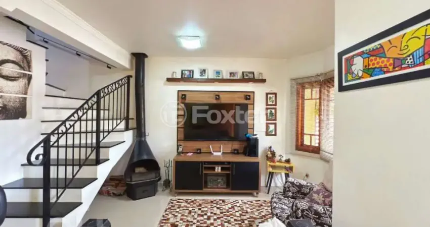 Casa em condomínio fechado com 2 quartos à venda na Avenida Edgar Pires de Castro, 1286, Hípica, Porto Alegre