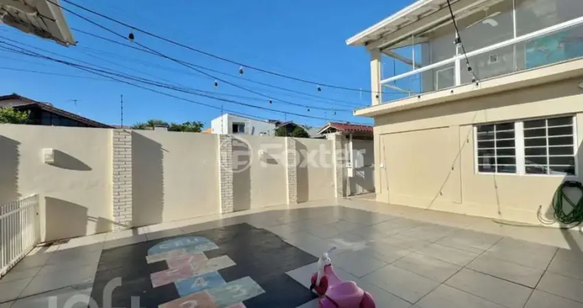 Casa com 3 quartos à venda na Rua Osvaldo Optiz, 443, Estância Velha, Canoas