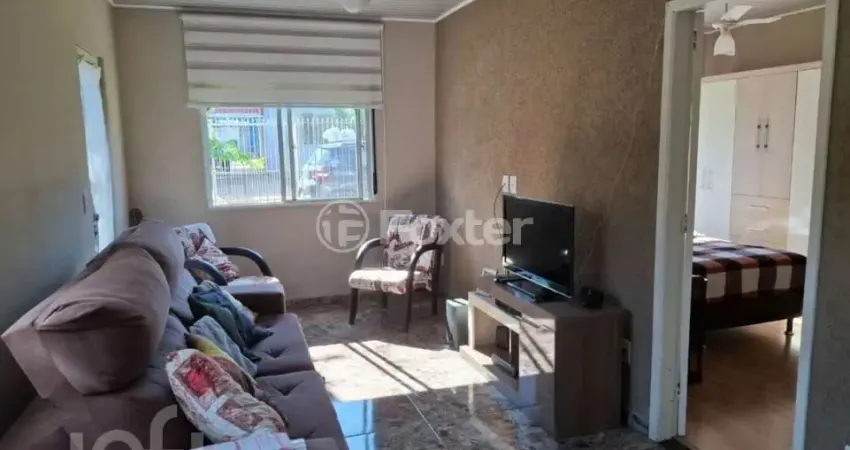 Casa com 4 quartos à venda na Rua Lalzina Ignácio da Silva, 9, Campo Novo, Porto Alegre