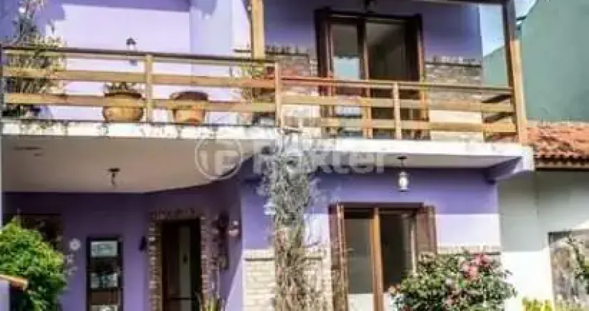 Casa em condomínio fechado com 2 quartos à venda na Rua Ponciano Pacheco da Silveira, 172, Guarujá, Porto Alegre