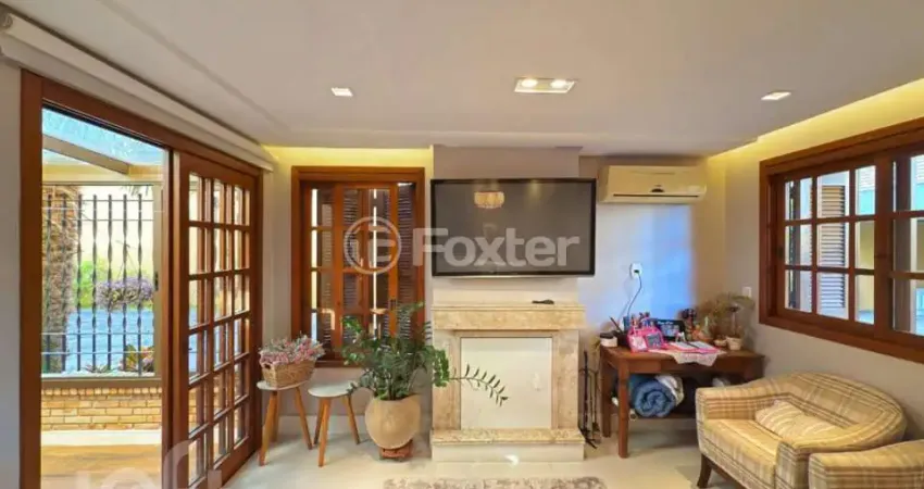 Casa em condomínio fechado com 3 quartos à venda na Avenida Coronel Marcos, 2171, Pedra Redonda, Porto Alegre