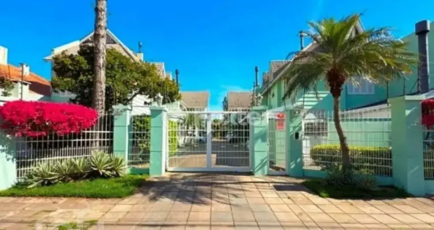 Casa em condomínio fechado com 4 quartos à venda na Rua Jacipuia, 275, Guarujá, Porto Alegre