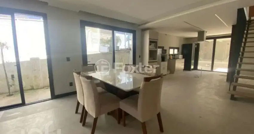 Casa com 4 quartos à venda na Rua Luiz Voelcker, 522, Três Figueiras, Porto Alegre