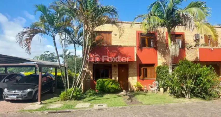 Casa em condomínio fechado com 3 quartos à venda na Avenida Vicente Monteggia, 2212, Cavalhada, Porto Alegre