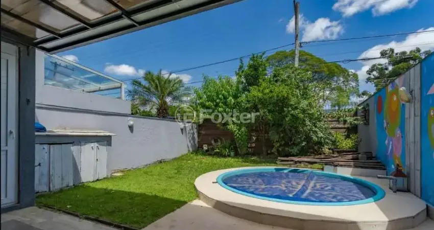 Casa em condomínio fechado com 3 quartos à venda na Rua Deputado Hugo Mardini, 1700, Passo das Pedras, Porto Alegre