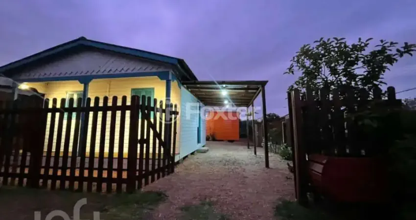 Casa com 4 quartos à venda na Rua Enfermeiro Ventura, 350, Vila Nova, Porto Alegre
