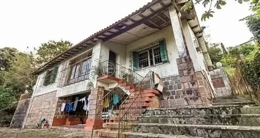 Casa com 4 quartos à venda na Rua Professor Xavier Simões, 500, Sétimo Céu, Porto Alegre