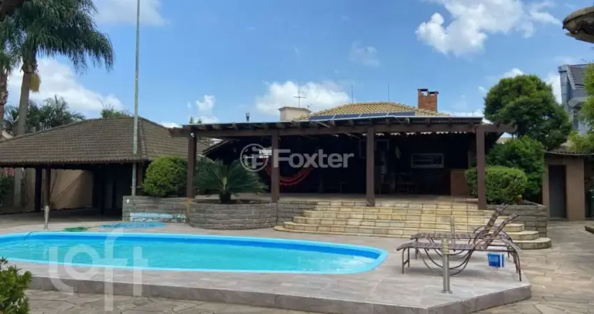 Casa com 6 quartos à venda na Rua das Hortênsias, 129, Igara, Canoas