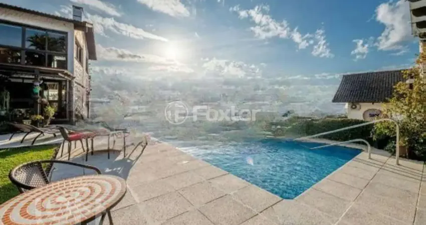 Casa com 5 quartos à venda na Rua Coroados, 1255, Vila Assunção, Porto Alegre