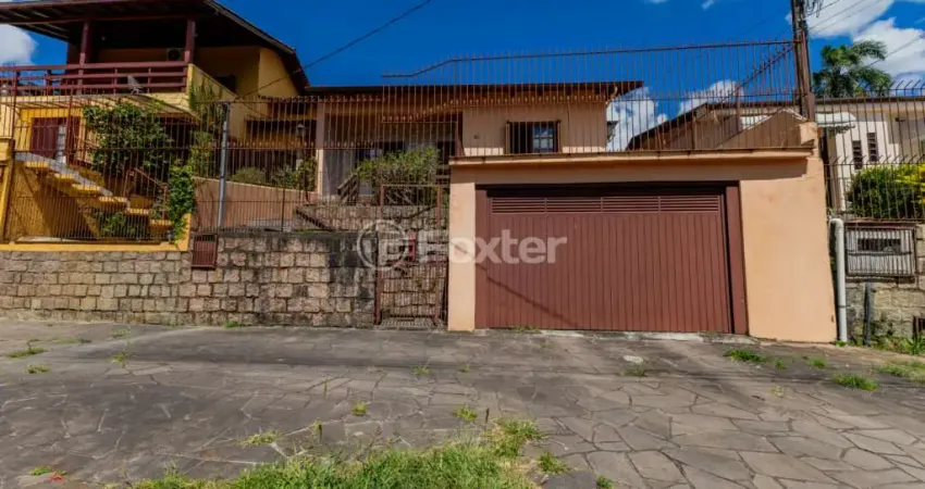Casa com 3 quartos à venda na Rua Vinte e Quatro de Agosto, 450, Jardim Itu Sabará, Porto Alegre