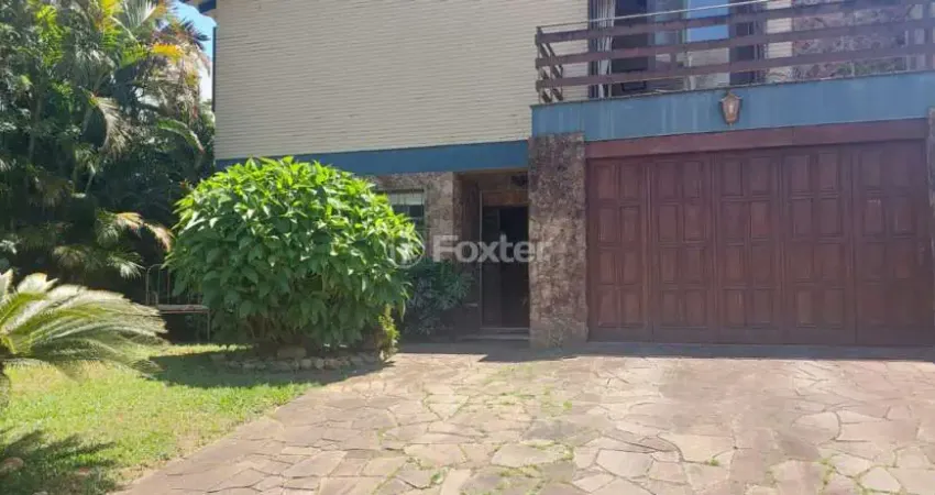 Casa com 4 quartos à venda na Rua Padre João Batista Reus, 378, Vila Conceição, Porto Alegre