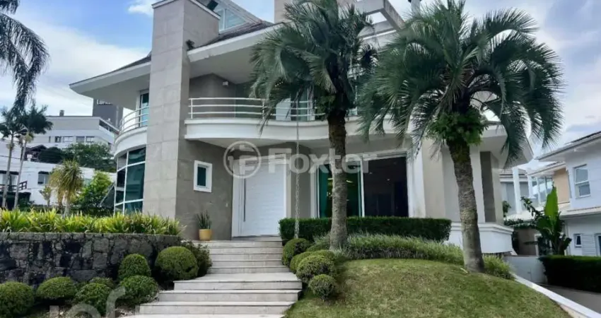 Casa em condomínio fechado com 4 quartos à venda na Estrada Haroldo Soares Glavan, 929, Cacupé, Florianópolis