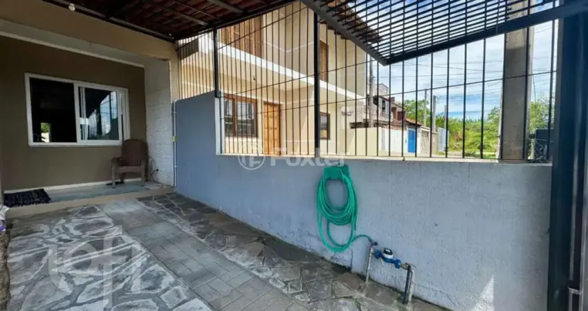 Casa com 2 quartos à venda na Rua Waldemar da Silva Tavares, 204, Guarujá, Porto Alegre