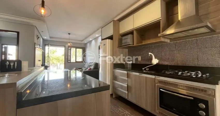 Casa com 3 quartos à venda na Rua Raul Cauduro, 810, Mário Quintana, Porto Alegre