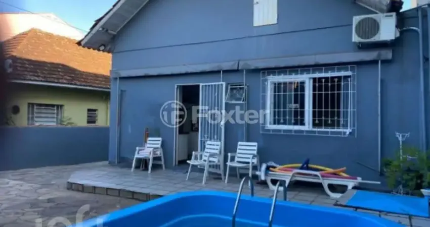 Casa com 3 quartos à venda na Rua Aparício Mariense, 174, Passo da Areia, Porto Alegre