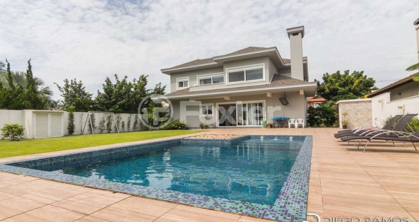Casa em condomínio fechado com 5 quartos à venda na Avenida Juca Batista, 8000, Belém Novo, Porto Alegre