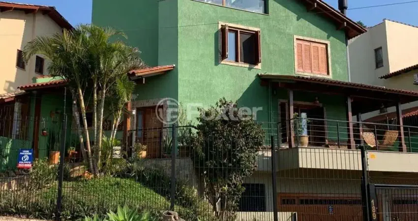 Casa com 4 quartos à venda na Rua Arachanes, 189, Espírito Santo, Porto Alegre