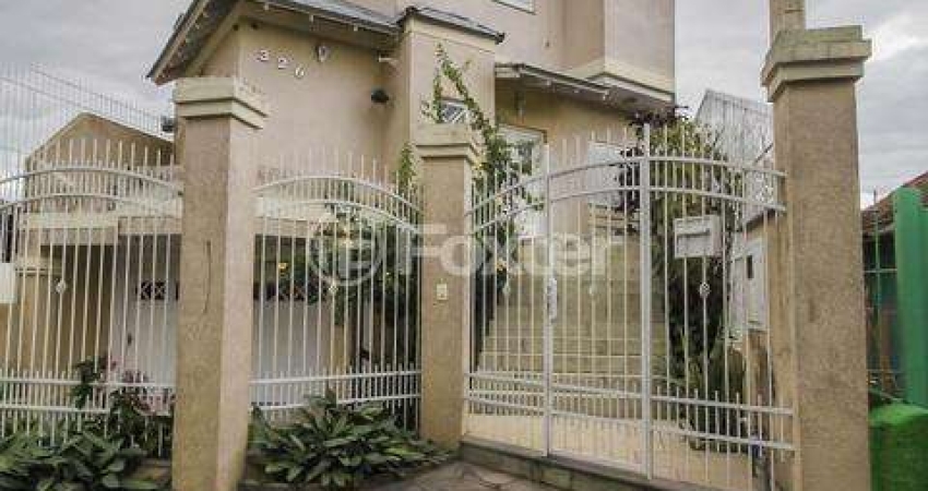 Casa com 3 quartos à venda na Rua Portuguesa, 326, Partenon, Porto Alegre