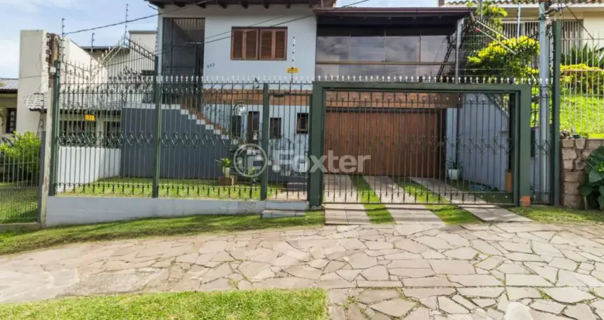 Casa com 3 quartos à venda na Rua Doutor Egydio Michaelsen, 250, Cavalhada, Porto Alegre