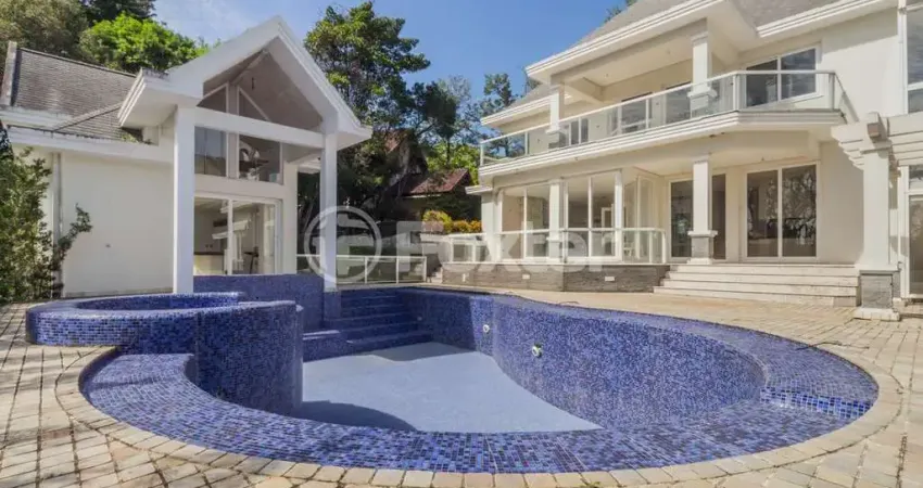 Casa em condomínio fechado com 4 quartos à venda na Avenida da Cavalhada, 5205, Cavalhada, Porto Alegre