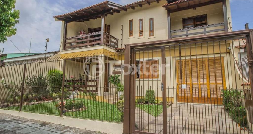 Casa com 4 quartos à venda na Avenida José Corrêa da Silva, 117, Cavalhada, Porto Alegre
