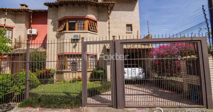 Casa com 3 quartos à venda na Rua Jacundá, 625, Guarujá, Porto Alegre