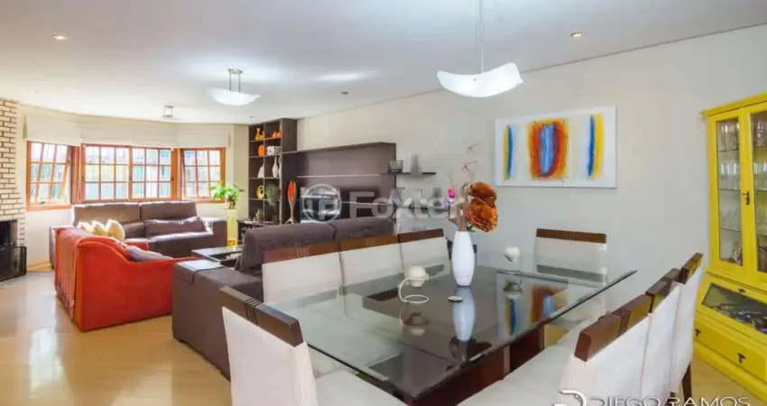 Casa com 3 quartos à venda na Rua Jacundá, 625, Guarujá, Porto Alegre