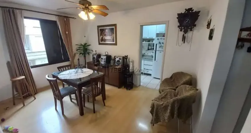 Apartamento padrão frente a fundos com 2 dormitórios garagem e elevador