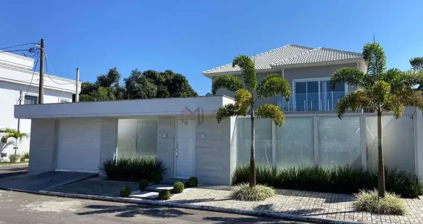 Casa de esquina de alto padrão no condomínio ilha de guaratiba em guaratiba.