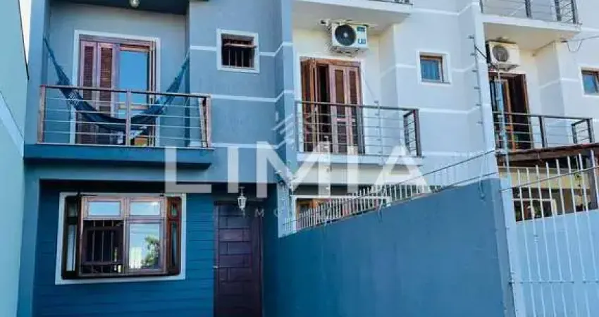 Casa com 3 quartos à venda na Rua Hugo Nelson Magalhães, 141, Parque Santa Fé, Porto Alegre