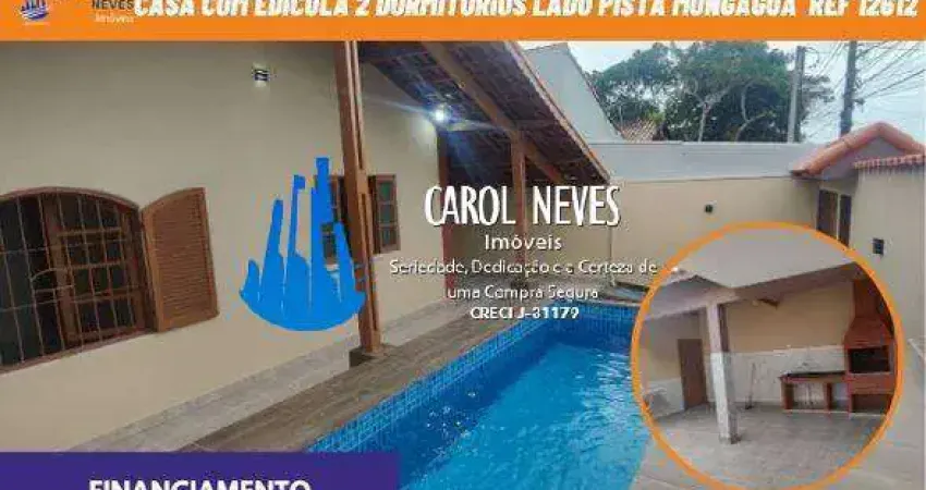 CASA TERREA 2 DORMITORIOS 1 SUITE PISCINA LADO PISTA FINANCIAMENTO MONGAGUA