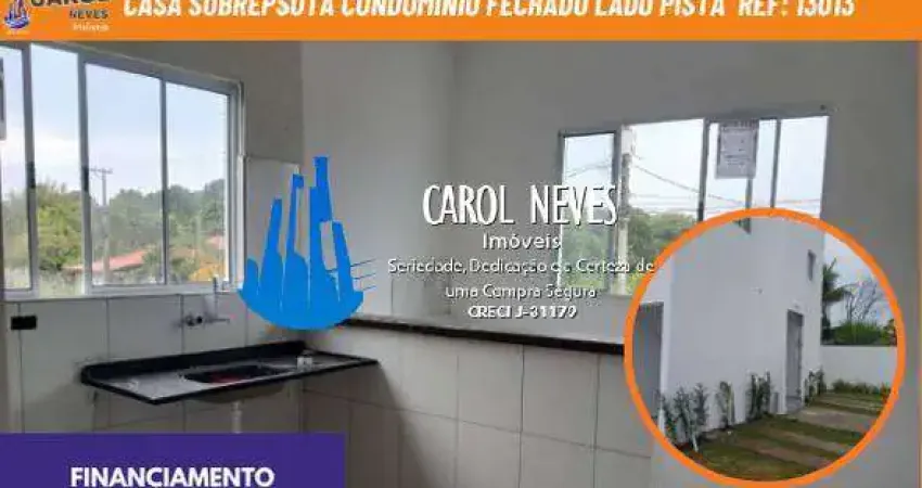 Casa sobreposta condominio fechado lado pista financiamento itanhaem