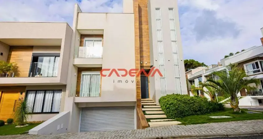 Casa em condomínio fechado com 4 quartos e 5 vagas à venda no Uberaba