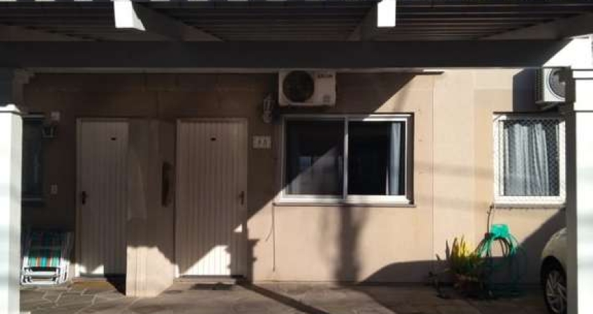 Casa em condomínio fechado com 2 quartos à venda no Rio Branco, Canoas 
