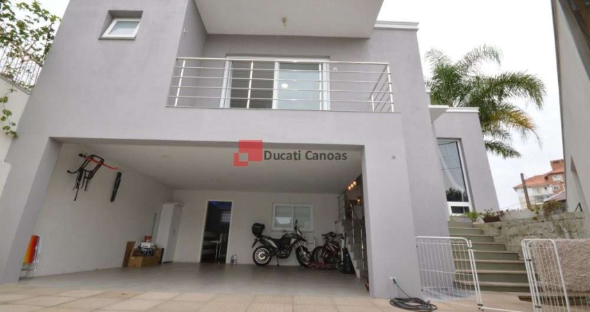 Casa com 5 quartos à venda no Igara, Canoas 