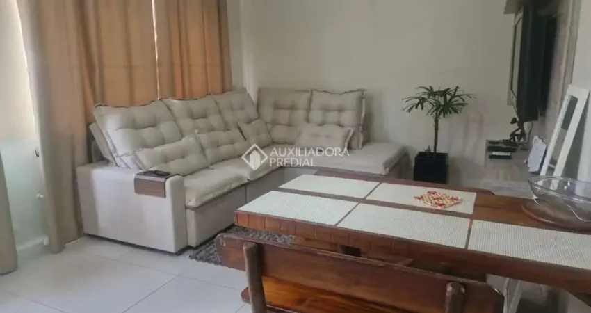 Casa com 3 quartos à venda na Rua Arabutan, 647, Navegantes, Porto Alegre