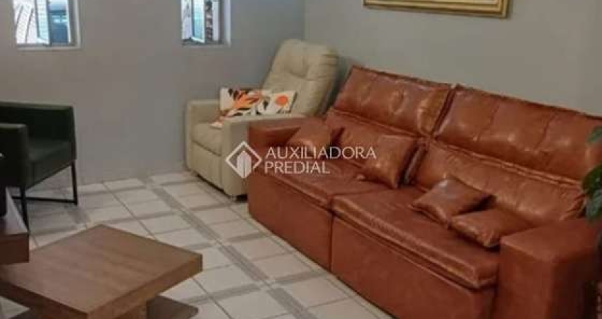 Casa com 4 quartos à venda na General Antônio Neto, 24, Parque Industriário, Santo André