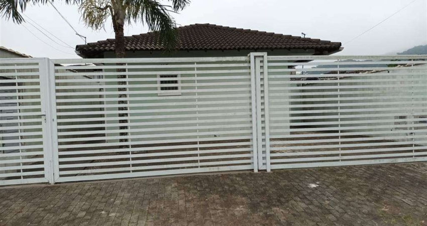 Casa à venda no Solemar, Praia Grande 