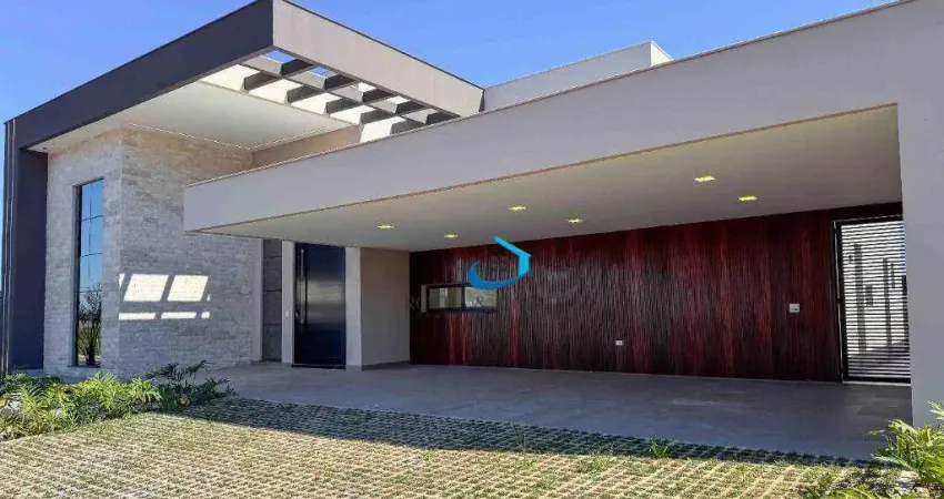 Casa Nova Térrea Alto Padrão Condomínio Villagio do Engenho A fachada é imponente com detalhes em pedra, vidro e Led 4 suítes 6 vagas Piscina