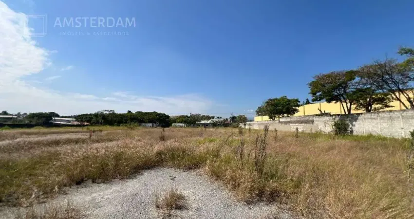 12.000 m² em Pindamonhangaba, área industrial, todo murado, plano, aterrado e pavimentado.