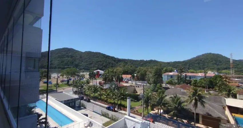 Prédio frente ao mar no centro de bertioga com 2 dormitórios, 1 suíte, 2 vagas de garagem cobertas, varanda gourmet envidraçada