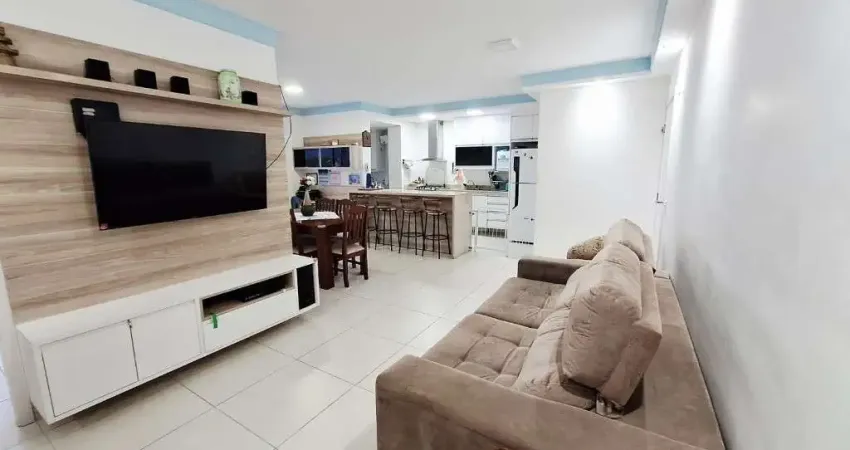 Prédio frente ao mar no centro de bertioga com 3 dormitórios, 1 suíte, 2 vagas de garagem cobertas, varanda gourmet