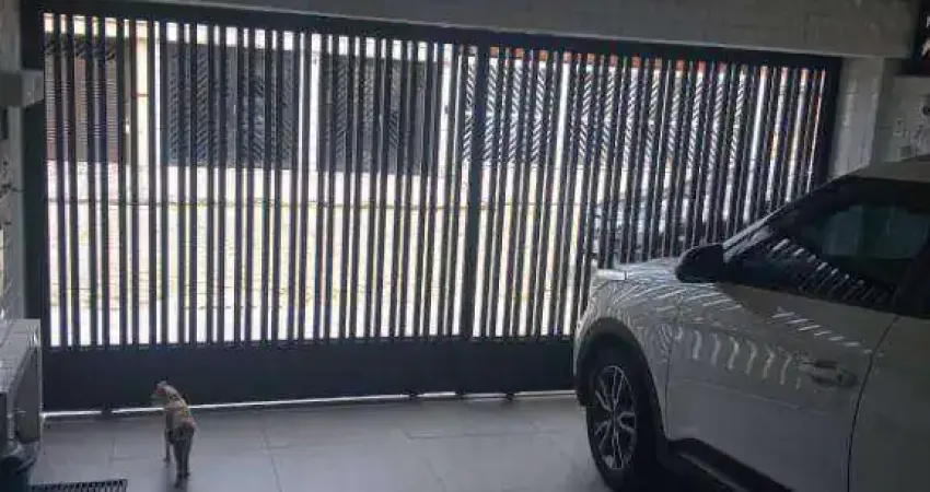 Casa com 4 dormitórios à venda, 148 m² por R$ 640.000,00 - Vila Voturuá - São Vicente/SP