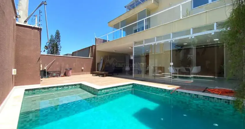 Casa à venda em Itanhaém-SP, na Praia do Sonho: 4 quartos, 3 suítes, 3 salas, 5 banheiros, 4 vagas de garagem, 284m² de área.