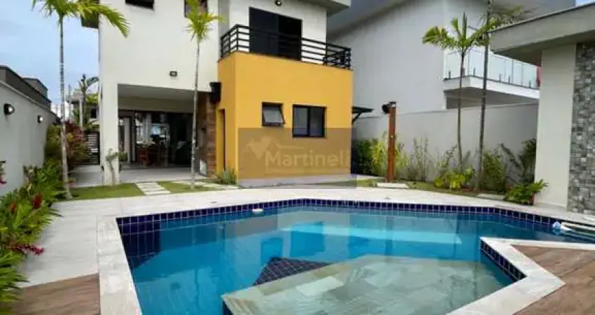 Casa em Condomínio de Luxo na Guacira em Itanhaém-SP: 3 Quartos, 3 Suítes, 3 Salas, 5 Banheiros, 3 Vagas, 177m².