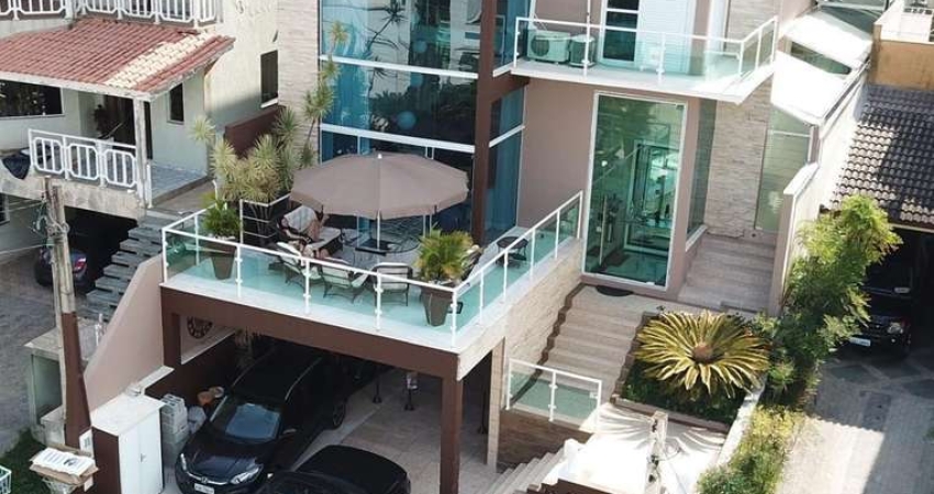 Casa alto padrão para venda com 3 suítes no Condomínio Aruã em Mogi das Cruzes.
