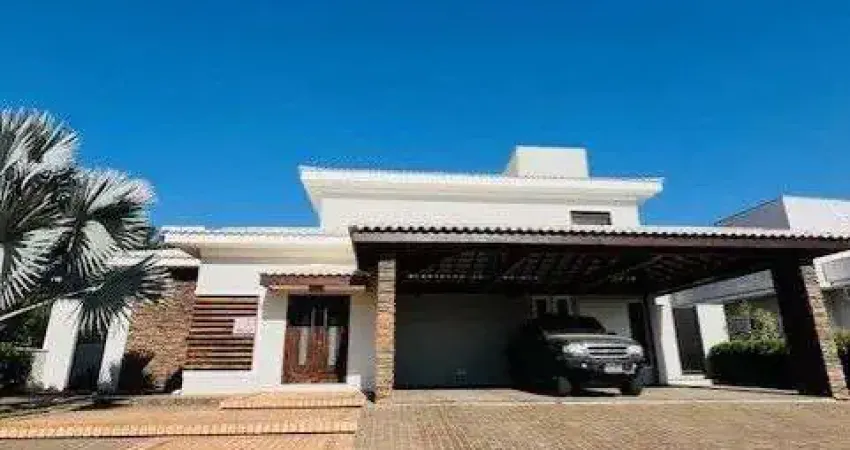 Casa com 6 dormitórios, 4 suites, 576 m² por R$ 2.400.000,00 - Condomínio Palmei