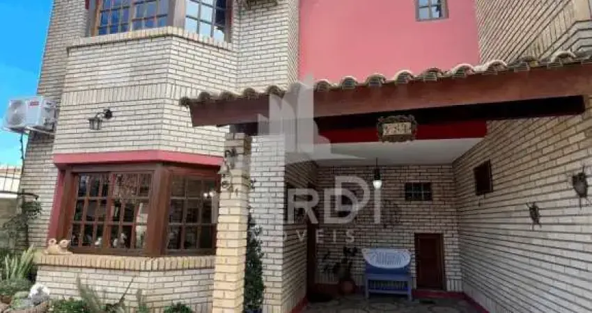 Casa com 3 quartos à venda na Rua Jacundá, 641, Guarujá, Porto Alegre