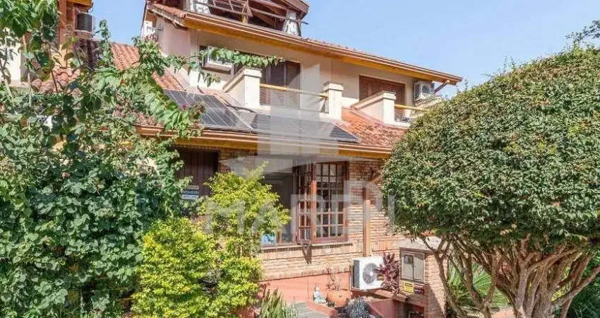 Casa em condomínio fechado com 3 quartos à venda na Avenida da Cavalhada, 6021, Cavalhada, Porto Alegre
