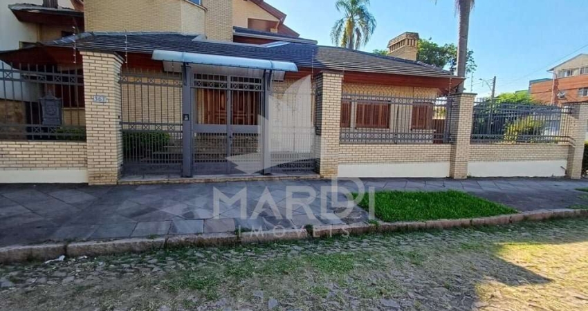 Casa com 4 quartos à venda na Rua Paissandu, 361, Partenon, Porto Alegre